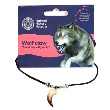 The Wolf Claw Necklace in its packaging, which has an illustration of a wolf leaping from the corner.