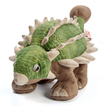 The Large Ankylosaurus Soft Toy faces forward, showing its green scaley head and body, brown legs and club tail at the back.