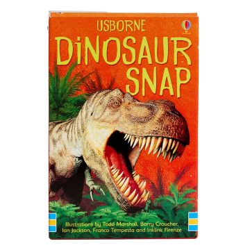 The front cover of the pack of cards has an illustration of a T. rex head roaring through fern-like plants.
