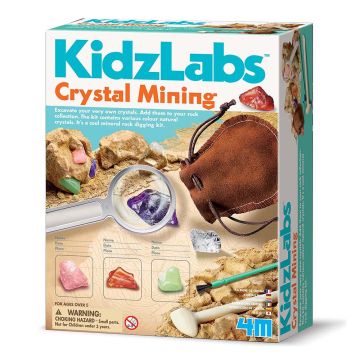 The front of the packaging shows some of the crystals with the pouch. A purple crystal is shown under the magnifying glass.