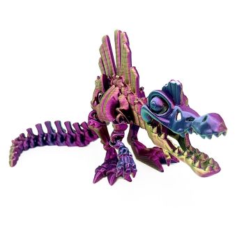 The model stands on all its back legs facing right. The colour of the model changes from a blue skull to a yellow and purple spine and tail. 