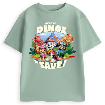The front of the green t-shirt has an illustration on the chest of some of the characters from PAW Patrol: The Dino Movie.