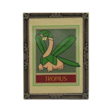 The front of the Pokémon Tropius Pin Badge in the style of the Natural History Museum’s botanical ceiling panels.