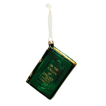 The green and gold On the Origin of Species book glass decoration hangs on a white ribbon.