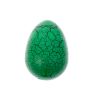The hatching egg is shown whole. It's coloured green with black cracking lines.