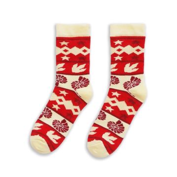The red socks are patterned with alternating rows of white T. rex tracks, burgundy ammonite shells and white stars. 
