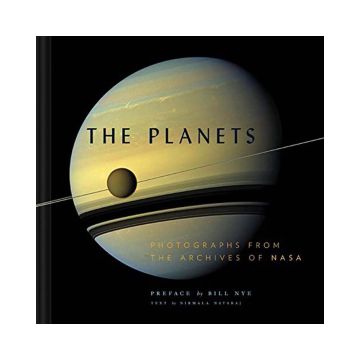 The front cover has a picture of a planet on it, which has horizontal stripes coloured black, grey and cream. There is a smaller moon orbiting across it on a ring. 