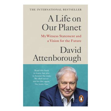 The front cover has a head and shoulders photo of David Attenborough on a blue background, next to a quote from The Sunday Times. He wears a dark blue suit jacket and white shirt. Above him is the title and his name. 