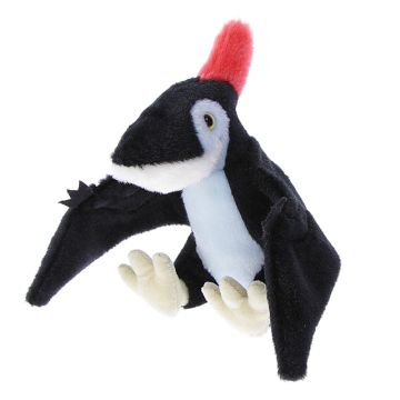 The toy sits with its black wings spread out and its white feet facing forwards. The crown of the head is black with a red crest. The chest and sides of the face are pale blue and the underside of the face is white.