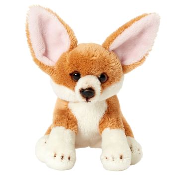 The fennec fox faces the camera, sitting on its back legs. Its paws, chest and lower half of its face are white, the inside of its ears is light pink, and the rest of its body is light brown. The eyes and nose are dark brown.