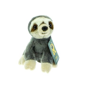 A front on view of the sloth with its green packaging label. The body is grey, with white hands, feet and face. Its eye patches are brown, its nose and eyes are black.