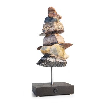 The rock cairn is displayed like a tower on its pole, against a white background.