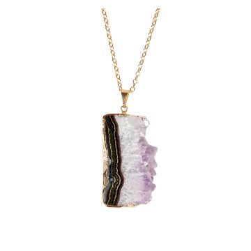 A close up of the amethyst slice pendant at the bottom of the gold chain. The slice is rectangular and shows a dark strip with gold streaks on the left, which moves into white then pale purple crystals towards the right.