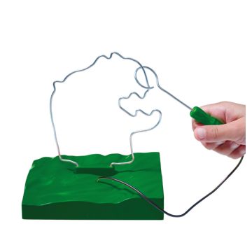 A young person's hand holds the loop handle (attached by a black wire to the green base) and demonstrates how to follow the wire frame of the T. rex head.