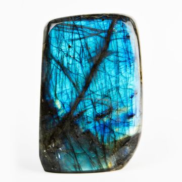 The smooth mineral piece is rectangular. It's bright blue and white with black scratches and a long black scar from top right to bottom left. 