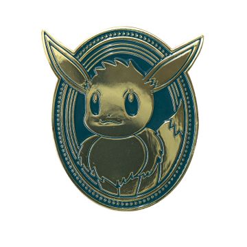 The front of the teal magnet depicts the Pokémon Eevee in gold, with Eevee’s ears pointing out beyond the oval shape.