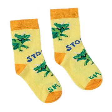 Two yellow ankle socks with orange trim, heels and toes, patterned with green Triceratops and the words ‘Stomp’ and ‘Smash’.