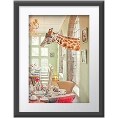 Breakfast Time Wall Print in a dark grey frame and white border. A giraffe pokes its head and neck through an arched window on the right, into a dining room. Below its neck is a table set for breakfast, surrounded by chairs.