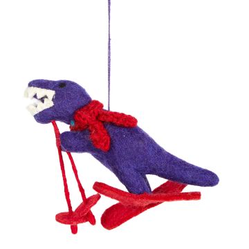 The Skiing T. rex Christmas Tree Decoration hanging by its thread, showing its purple body and red scarf, ski poles and skis.