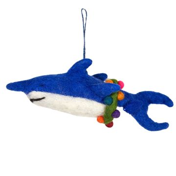 The blue part of the body includes the long nose, two fins and split tail, and the underbelly is white. Hooped around the tail is a green wreath with coloured baubles, also made of wool.