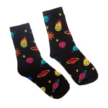 The pair of socks are laid flat next to each other. The socks are black with yellow stars and smiling pink Saturns and orange suns.