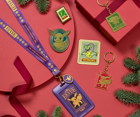 Pokémon accessories, including key rings, pin badges and a lanyard featuring Eevee.