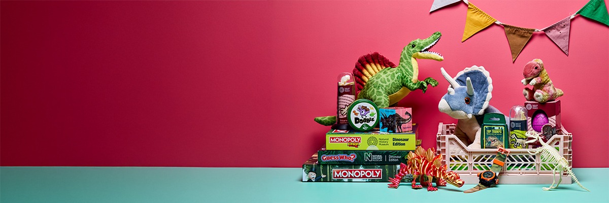 Dinosaur-themed toys, games and models styled with bunting.
